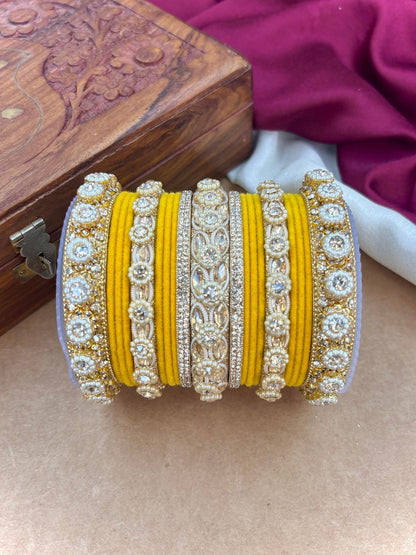 Ishhaara Gold Plated Kundan Bangle Set - A set of gold plated kundan bangles with intricate designs and velvet inner lining - view 23