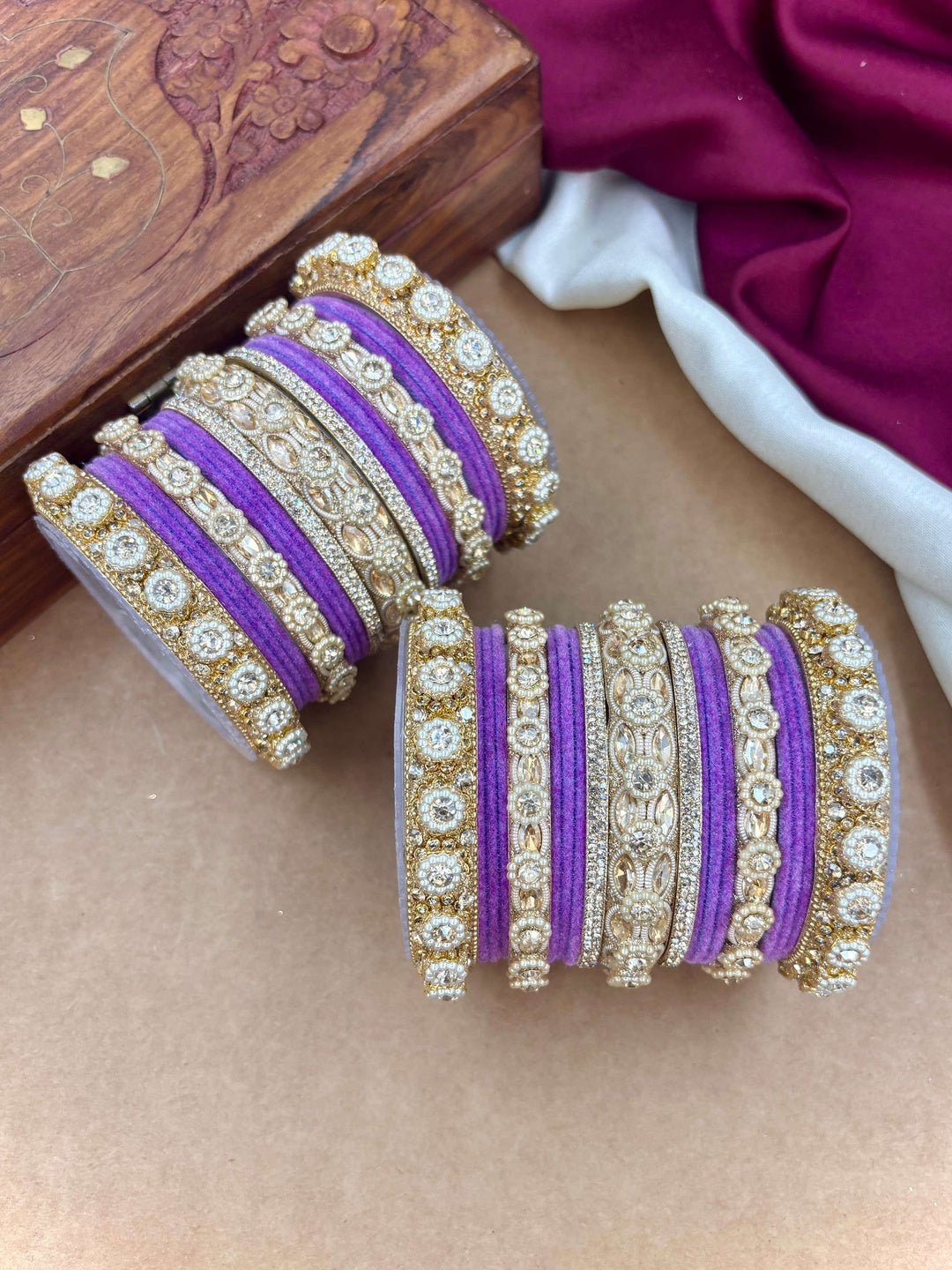 Ishhaara Gold Plated Kundan Bangle Set - A set of gold plated kundan bangles with intricate designs and velvet inner lining - view 6