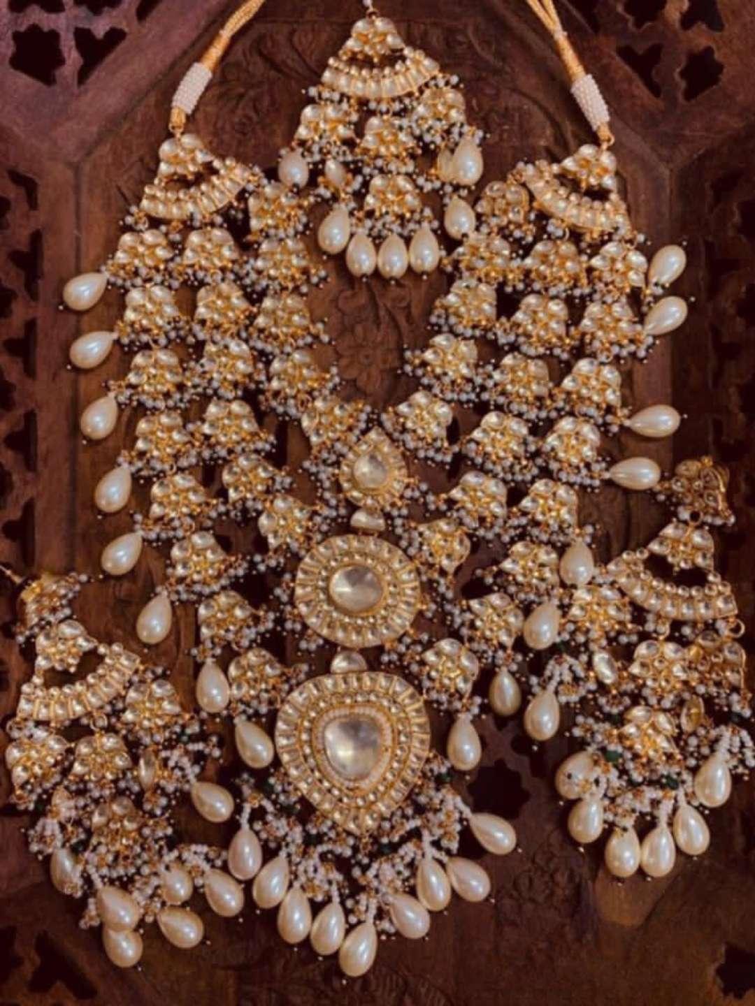 Ishhaara Gold Plated Kundan Studded Pearl Necklace And Earring Jewellery Set.
