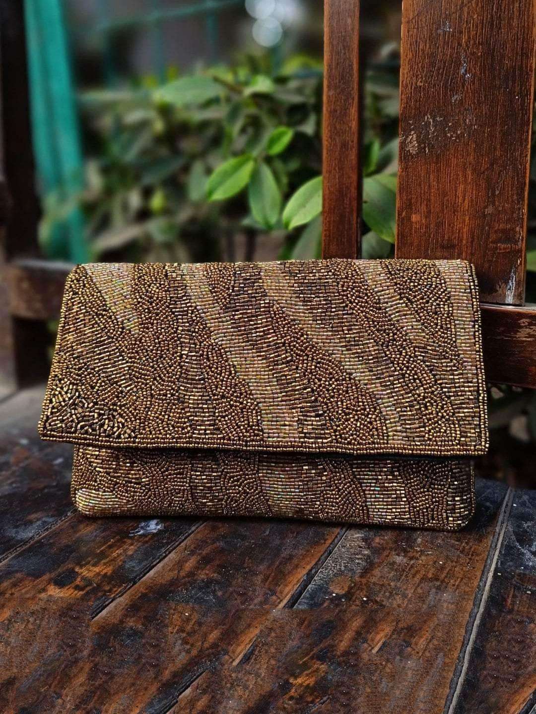 Ishhaara Gold Toned Embellished Clutch