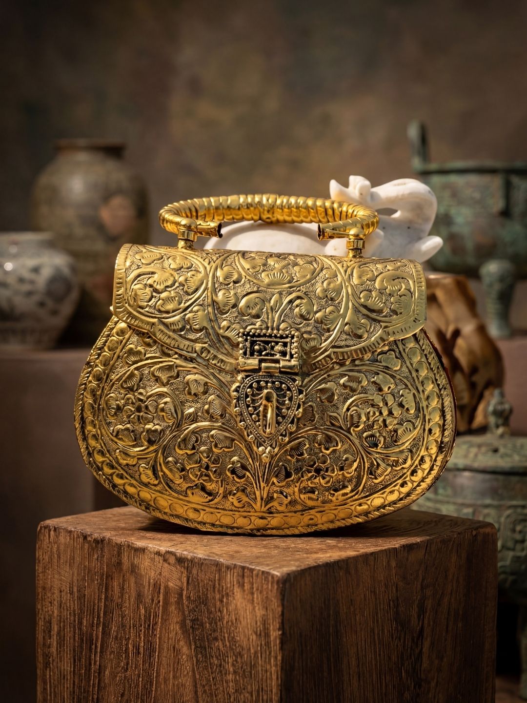 Ishhaara Golden Metal Clutch
