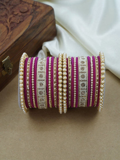 Ishhaara Green and Gold Embellished Bangle Set - a stack of green and gold bangles with pearl and velvet details - view 14