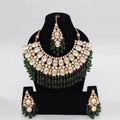 Ishhaara Green Big Kundan Semi Circular Necklace Earring And Teeka Set