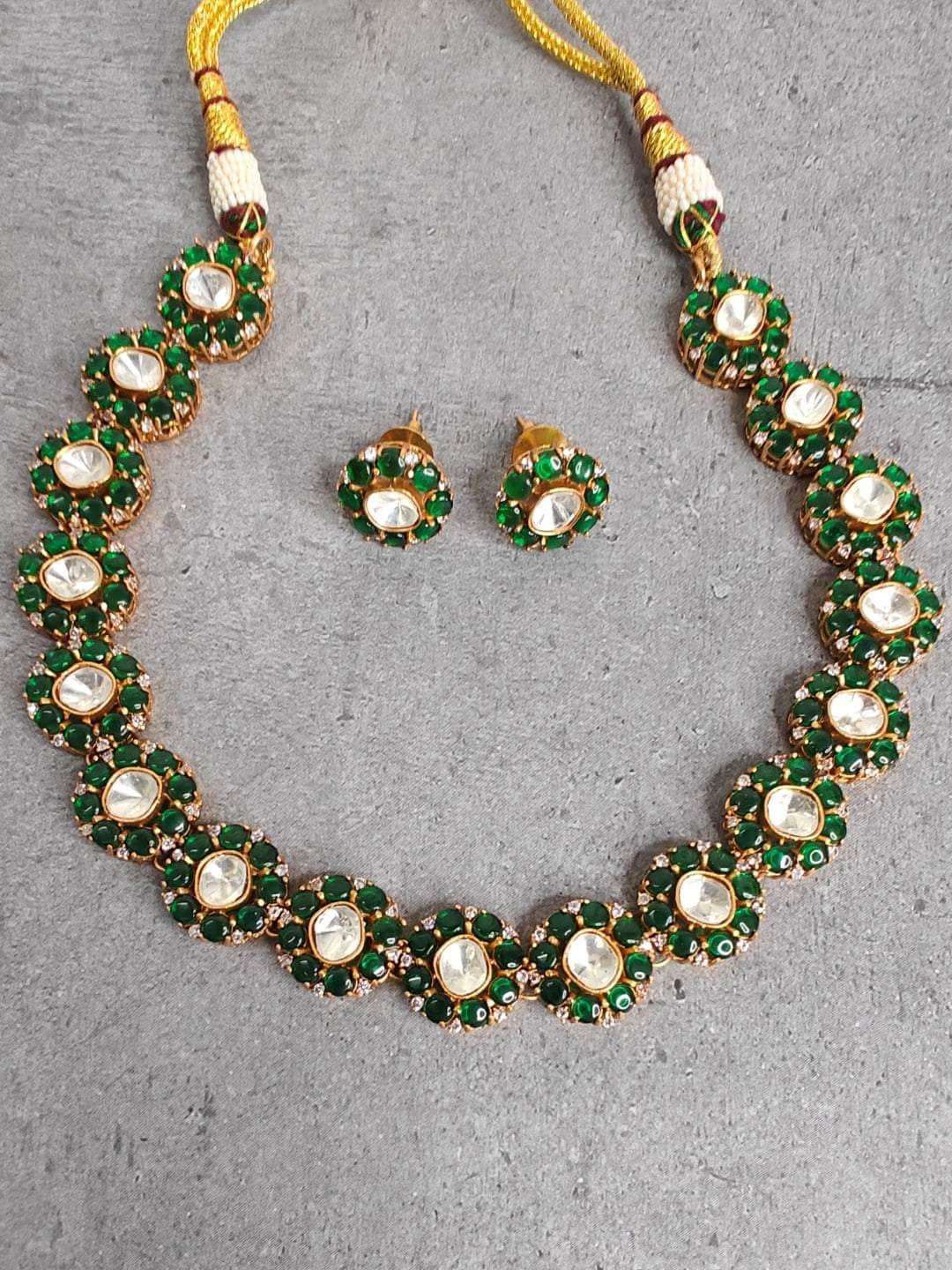 Ishhaara Green Colored Kundan Necklace And Earring Set