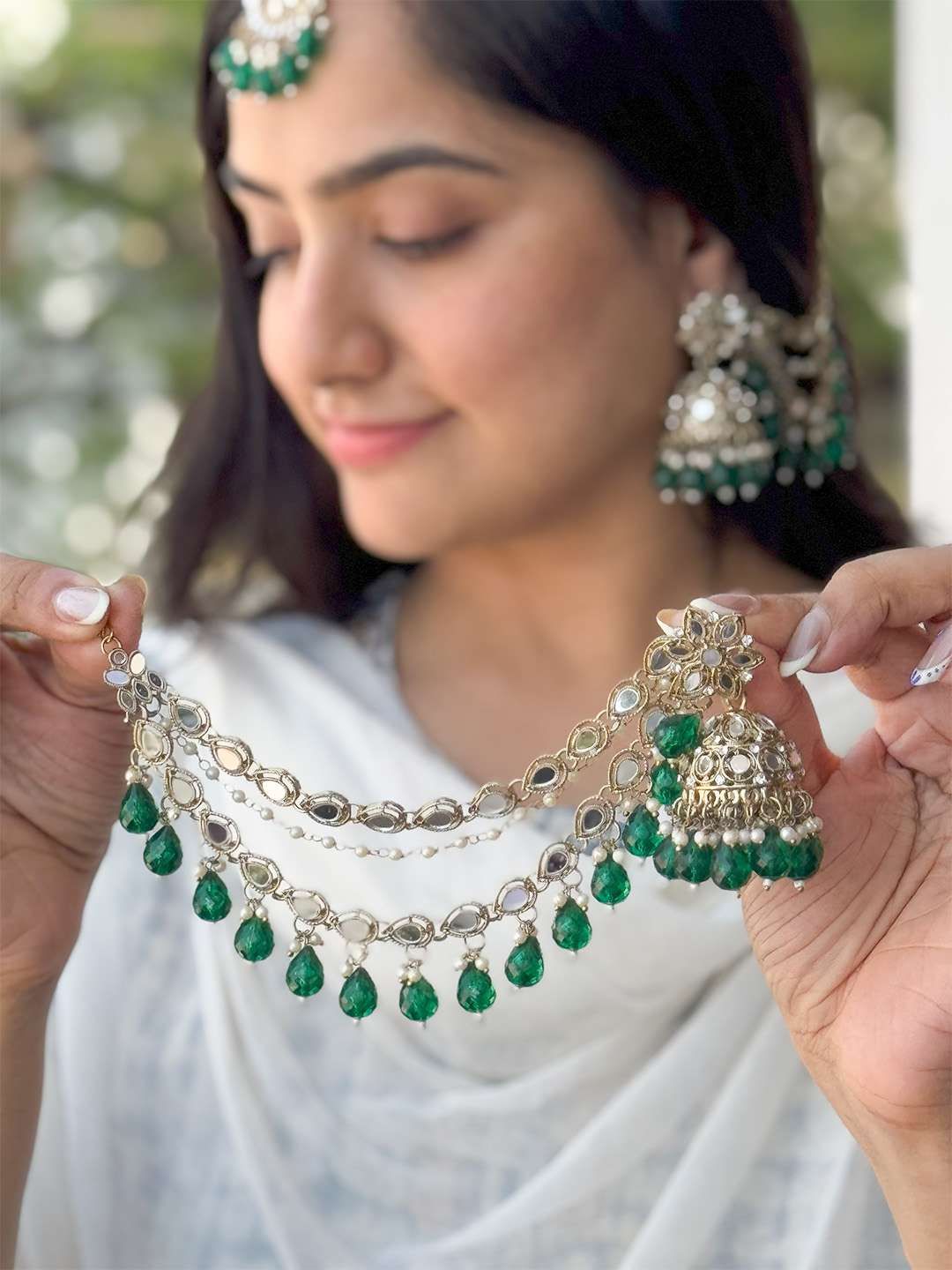 Ishhaara Green Kundan And Pearl Embellished Jhumkas With Earchain And Teeka