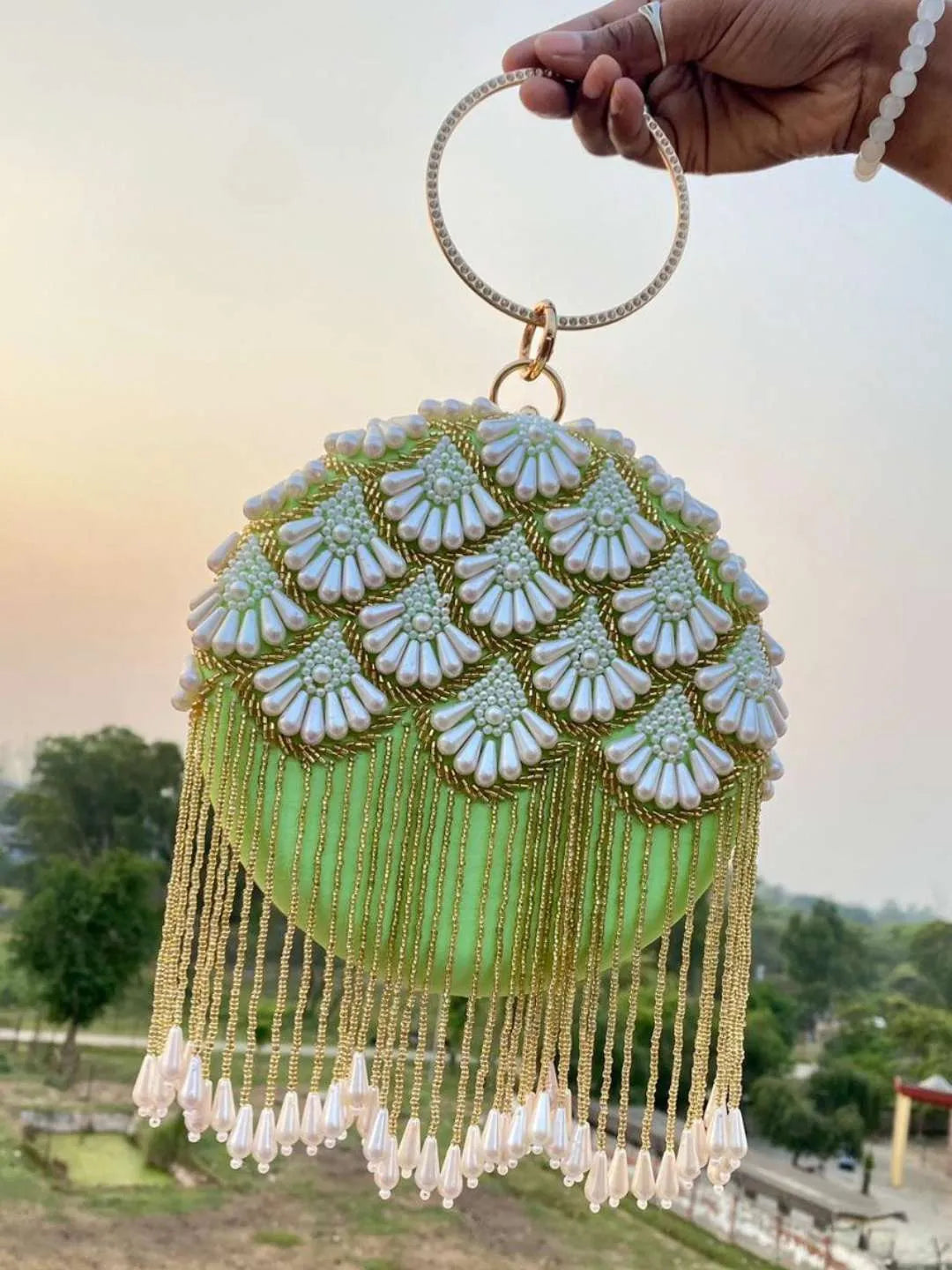 Ishhaara Green Matka Embroidered Design In Round Clutch