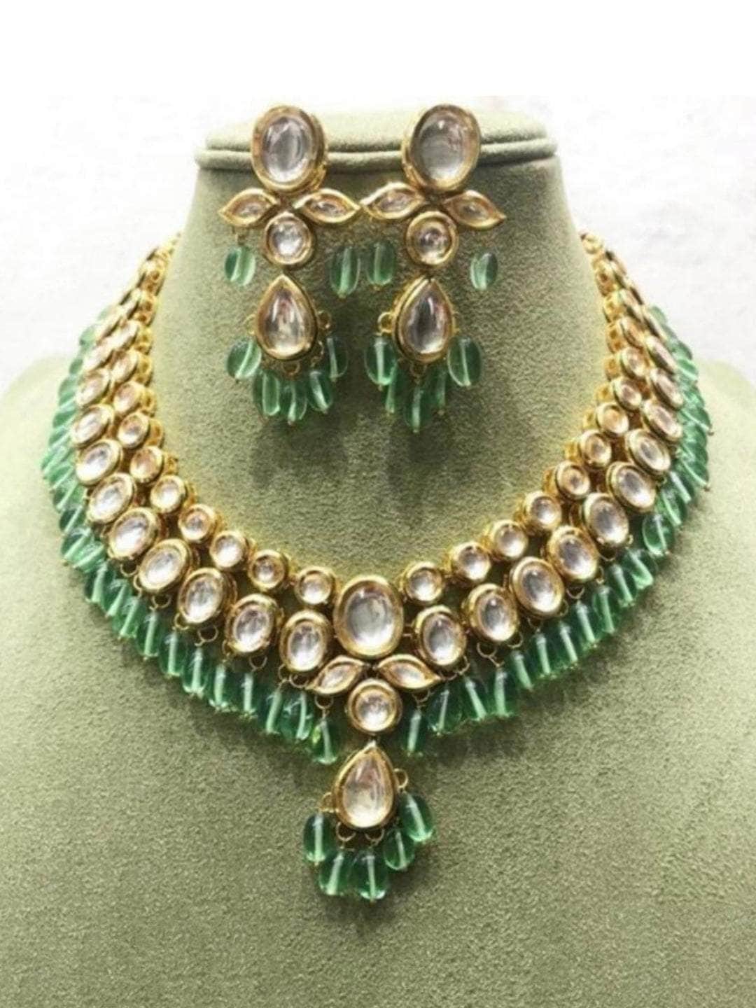 Ishhaara Green Oval And Leaf Kundan Necklace