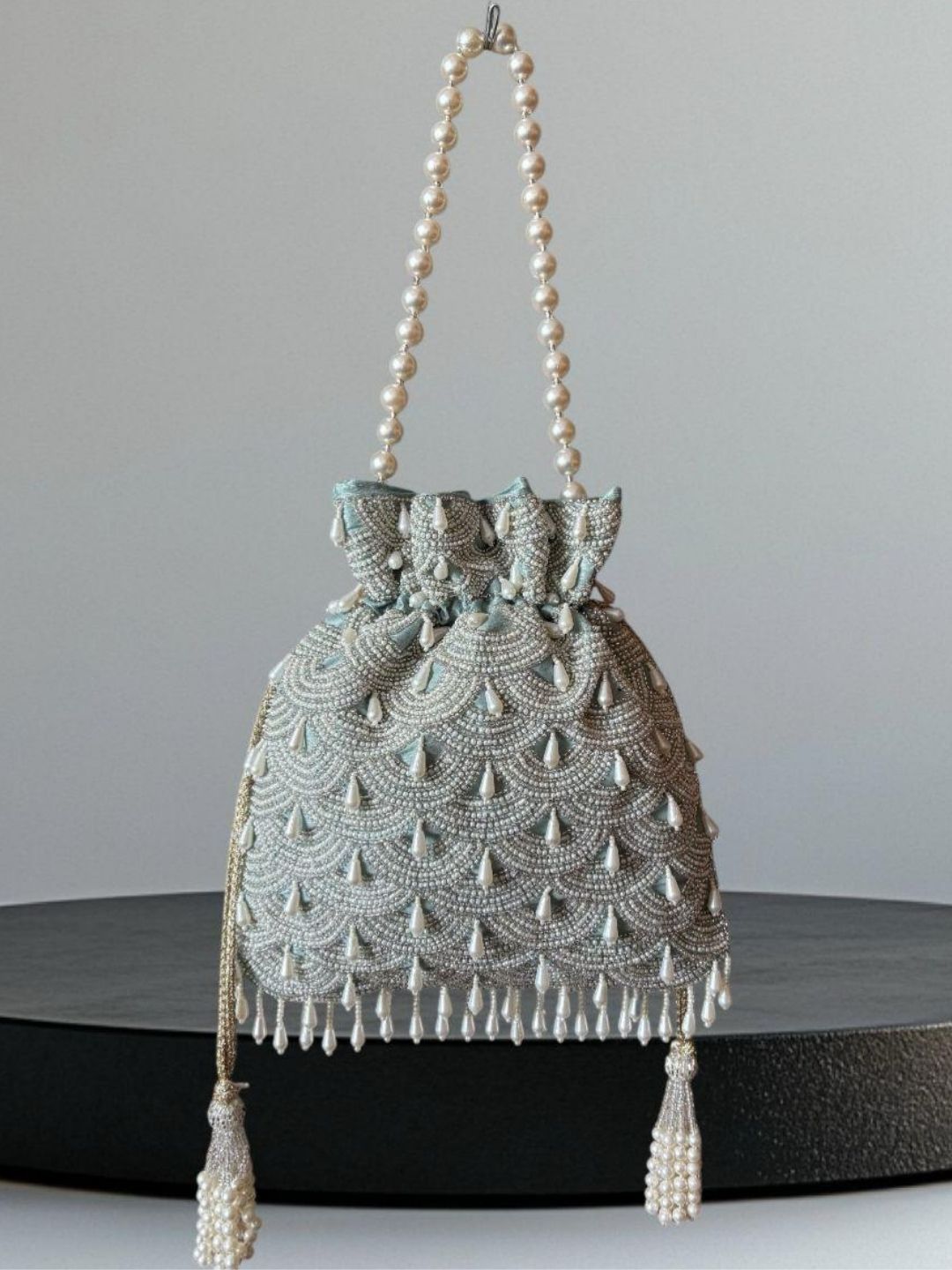 Ishhaara White Pearl Drop Silk Potli Bag