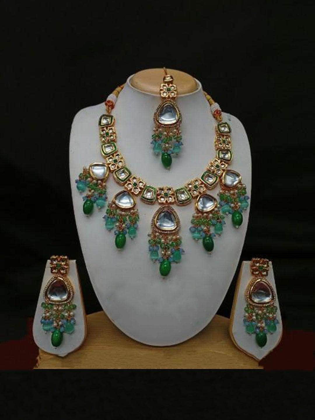 Ishhaara Green Triangular Hanging Kundan Necklace Earring And Teeka Set