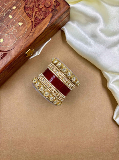 Ishhaara Handcrafted Kundan Bangles Set - a stack of intricately designed bangles with red glass center - view 6