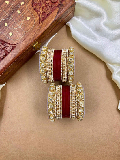 Ishhaara Handcrafted Kundan Bangles Set - a stack of intricately designed bangles with red glass center - view 8