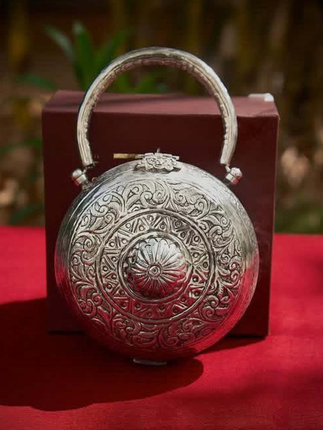 Ishhaara Handcrafted Round Antique Silver Metal Clutch Bag