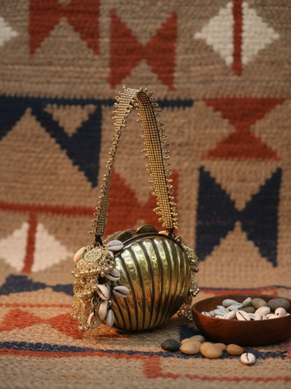 Ishhaara Handcrafted Shell Shaped Banjara Metal Clutch