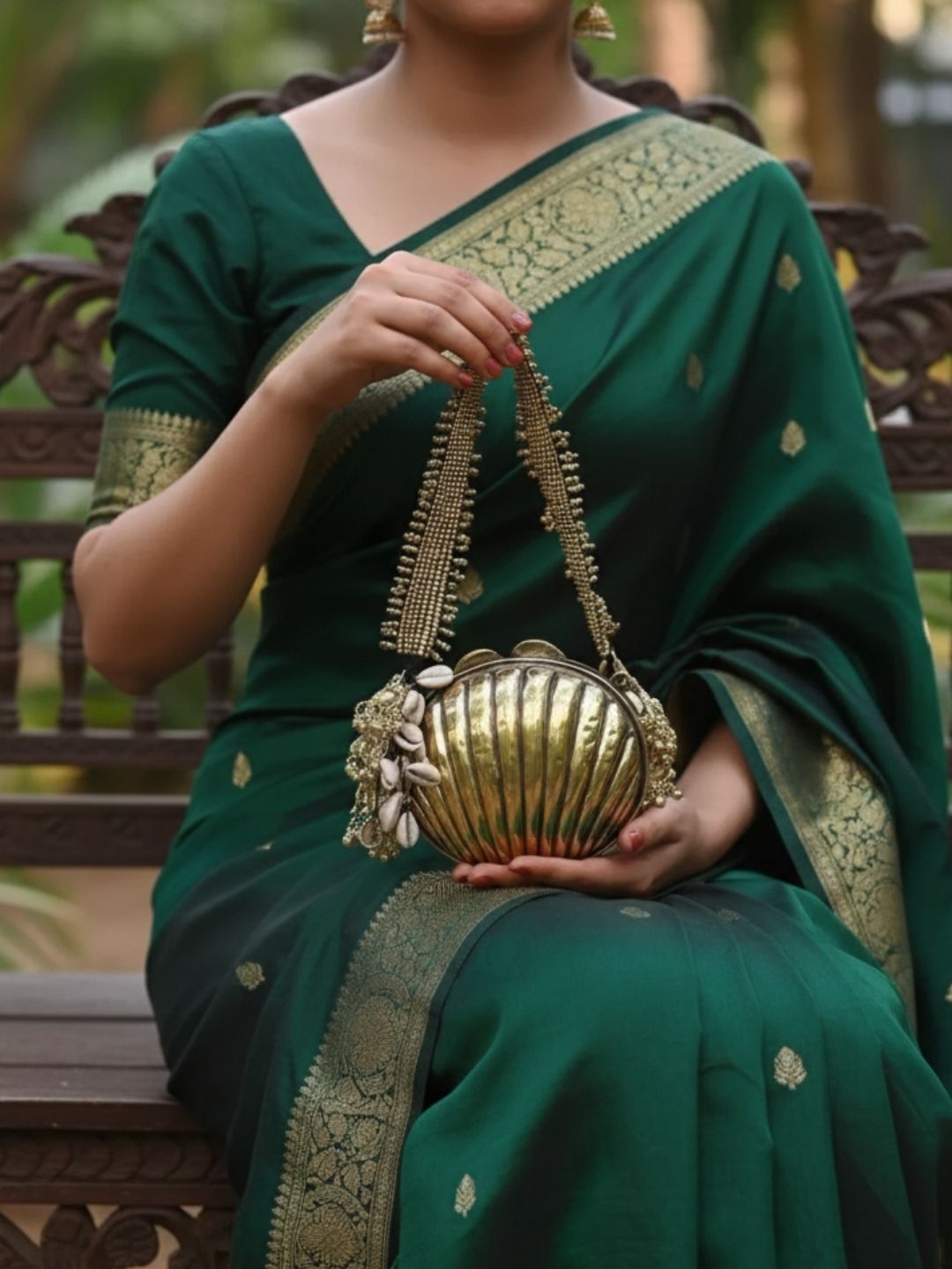 Ishhaara Handcrafted Shell Shaped Banjara Metal Clutch