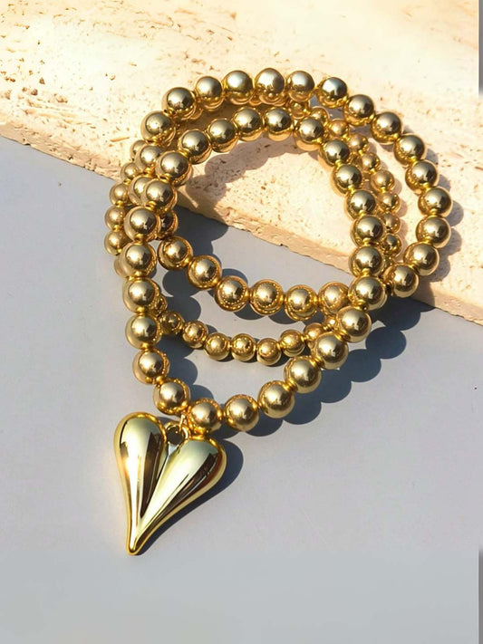 Ishhaara Heart Shaped Charm Studded Golden Whimsy Bracelet