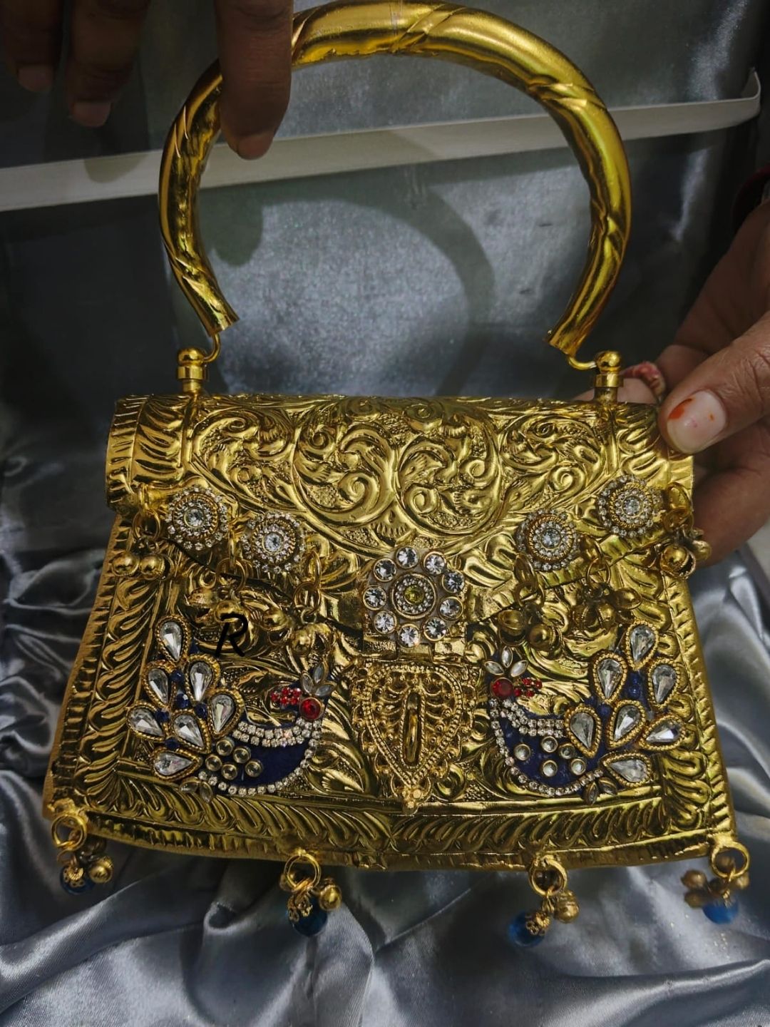Ishhaara Heritage Peacock Gold Clutch
