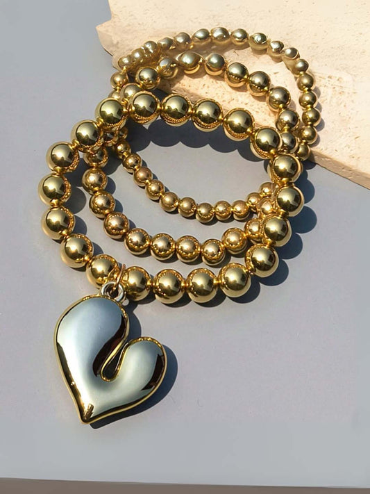 Ishhaara Irregular Heart Shaped Charm Studded Golden Whimsy Bracelet
