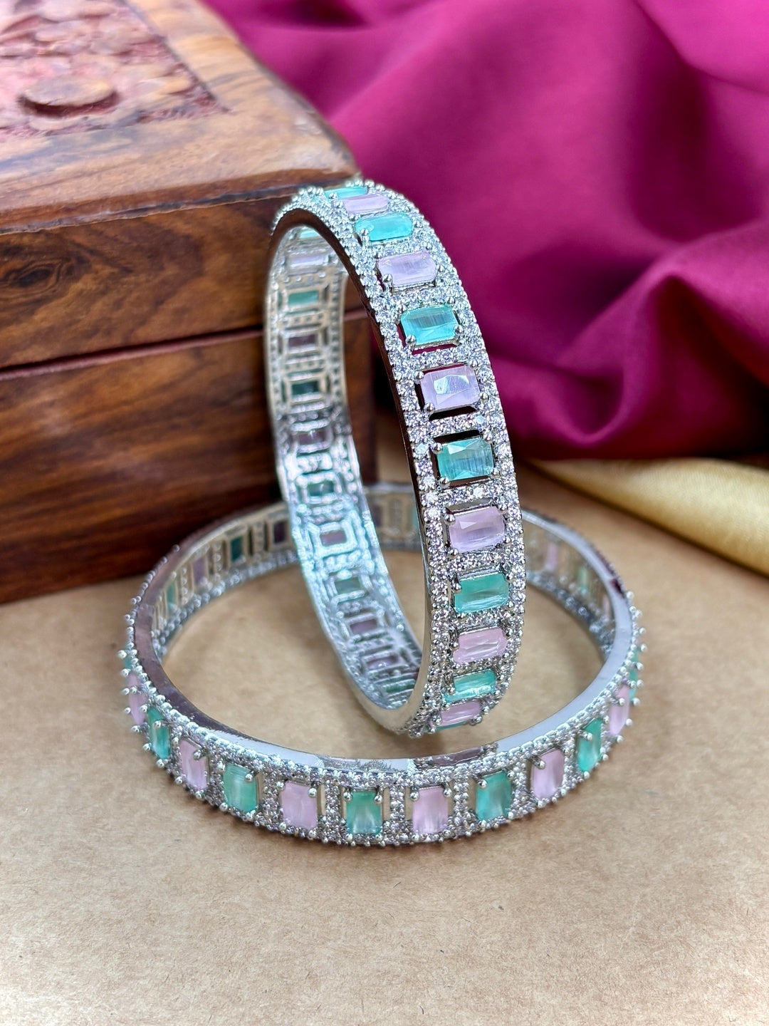 Ishhaara CZ Kundan Bangles - silver-toned bangles with pink and green stones
