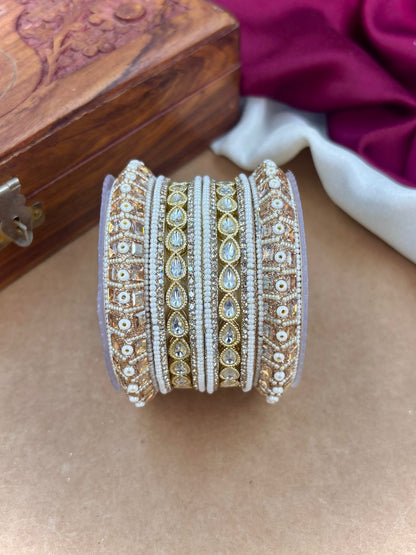 Ishhaara Kundan Bangle Set - A pair of intricately designed gold and white bangles with Kundan work - view 5