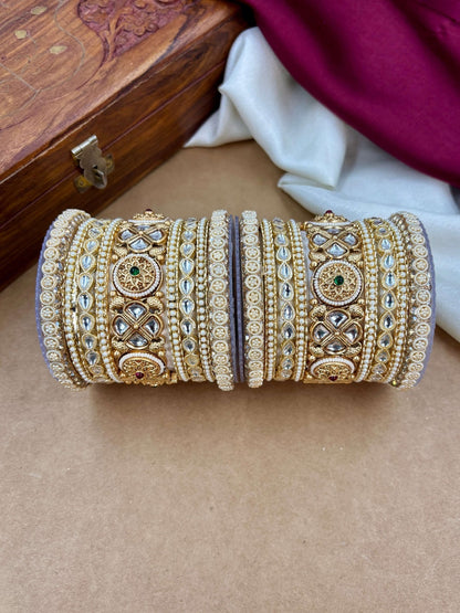 Ishhaara Kundan Bangle Set - A close-up view of a beautifully crafted Kundan bangle set with intricate designs and precious stones - view 3