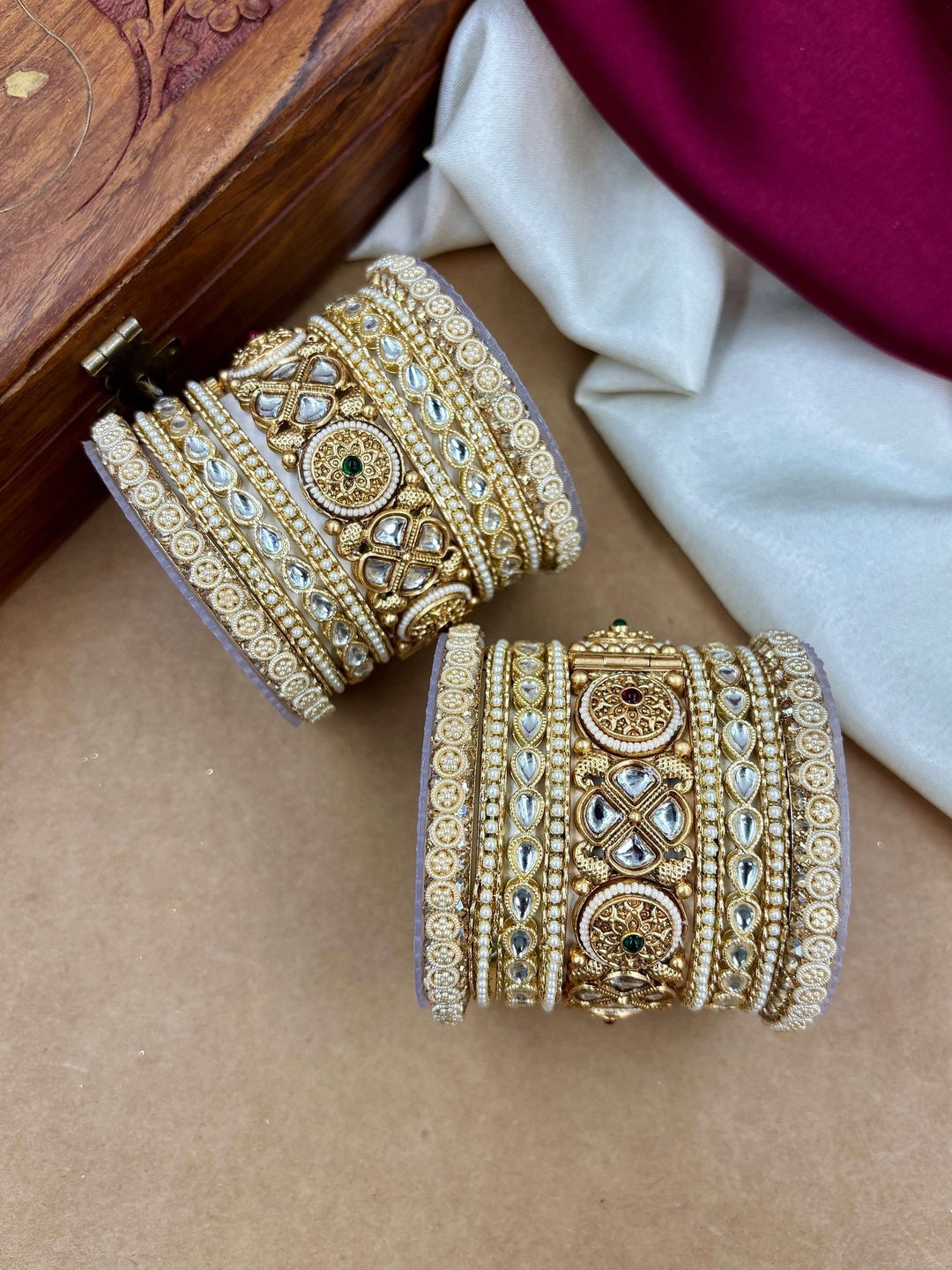 Ishhaara Kundan Bangle Set - A close-up view of a beautifully crafted Kundan bangle set with intricate designs and precious stones - view 4
