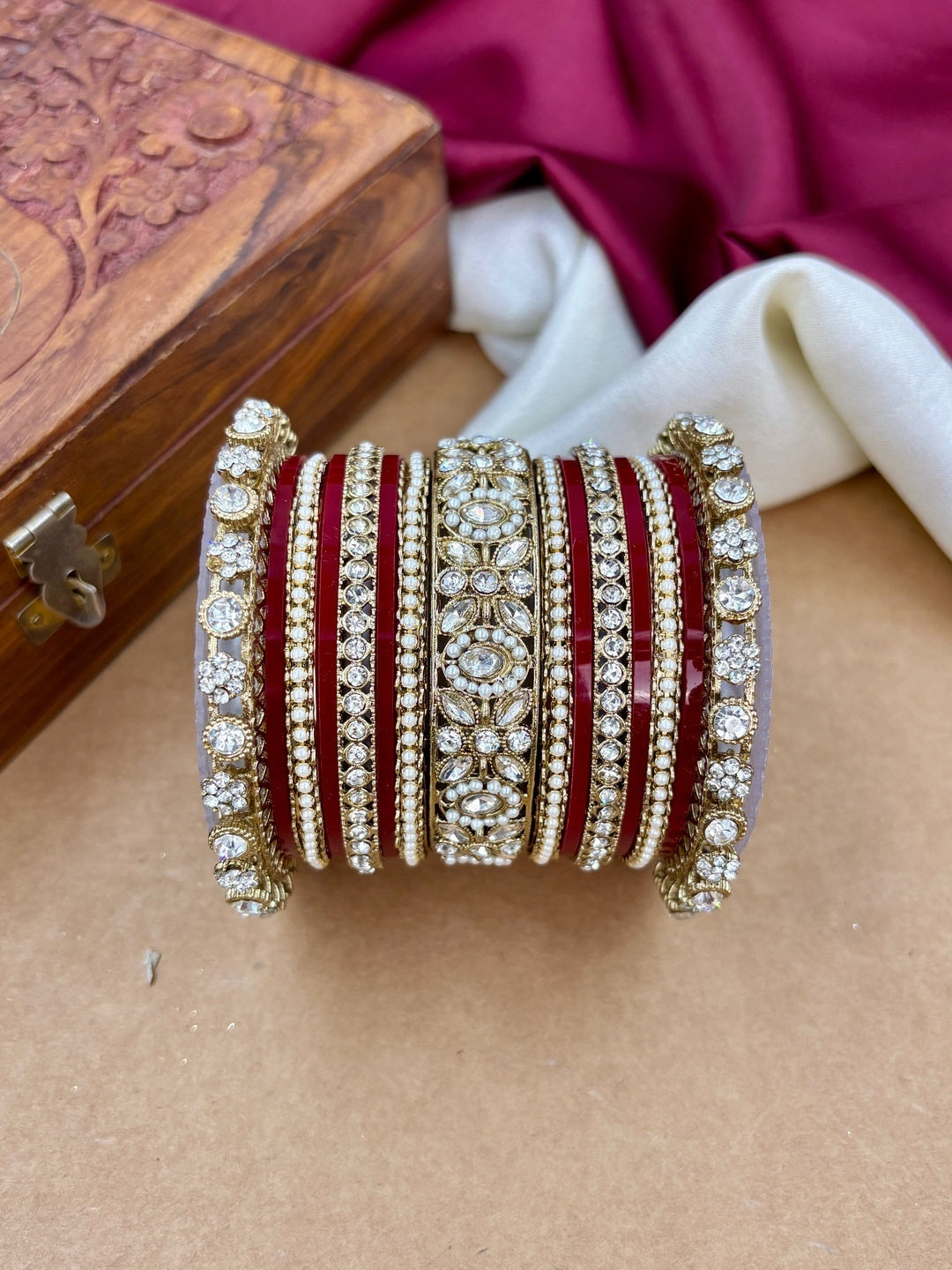 Ishhaara Kundan Bangle Set For Women - a pair of intricately designed red and white bangles with stones - view 2
