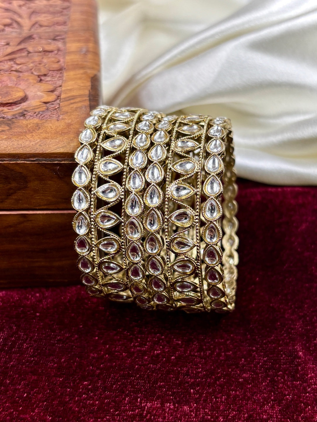 Ishhaara Kundan Bangle Set in gold finish with intricate designs and high-quality stones - view 3
