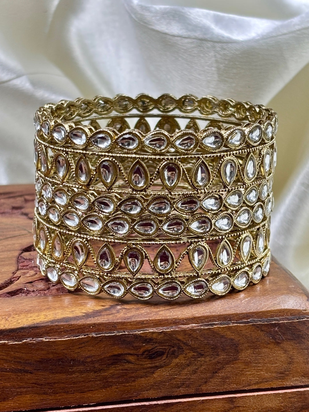 Ishhaara Kundan Bangle Set in gold finish with intricate designs and high-quality stones - view 4
