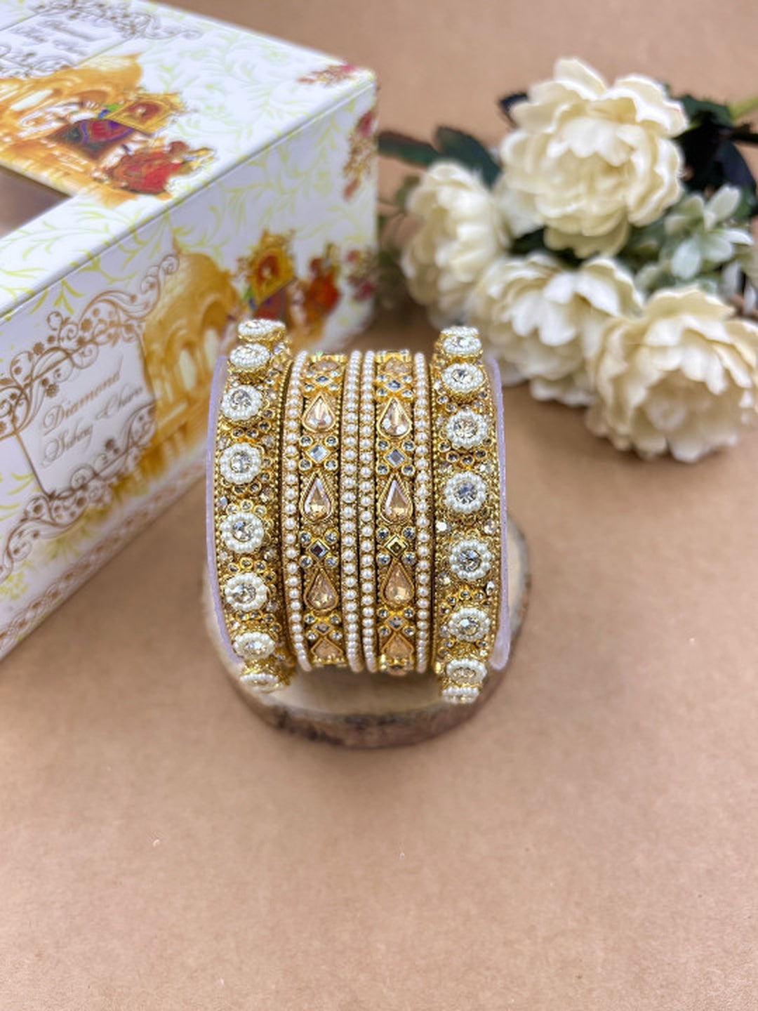 Ishhaara Kundan Bangles Set For Women - gold-toned bangles with kundan stones and pearls