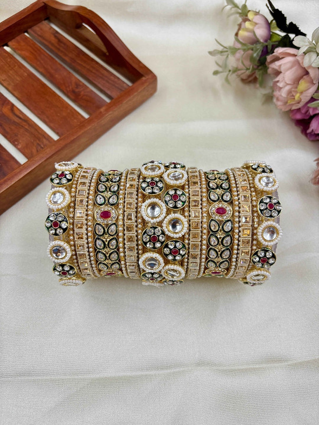 Ishhaara Kundan Bangles Set - a set of intricately designed gold bangles adorned with stones - view 2