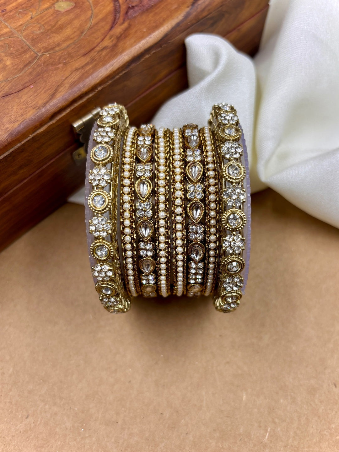 Ishhaara Kundan Bangles Set - A beautiful set of gold bangles adorned with stones and pearls - view 3
