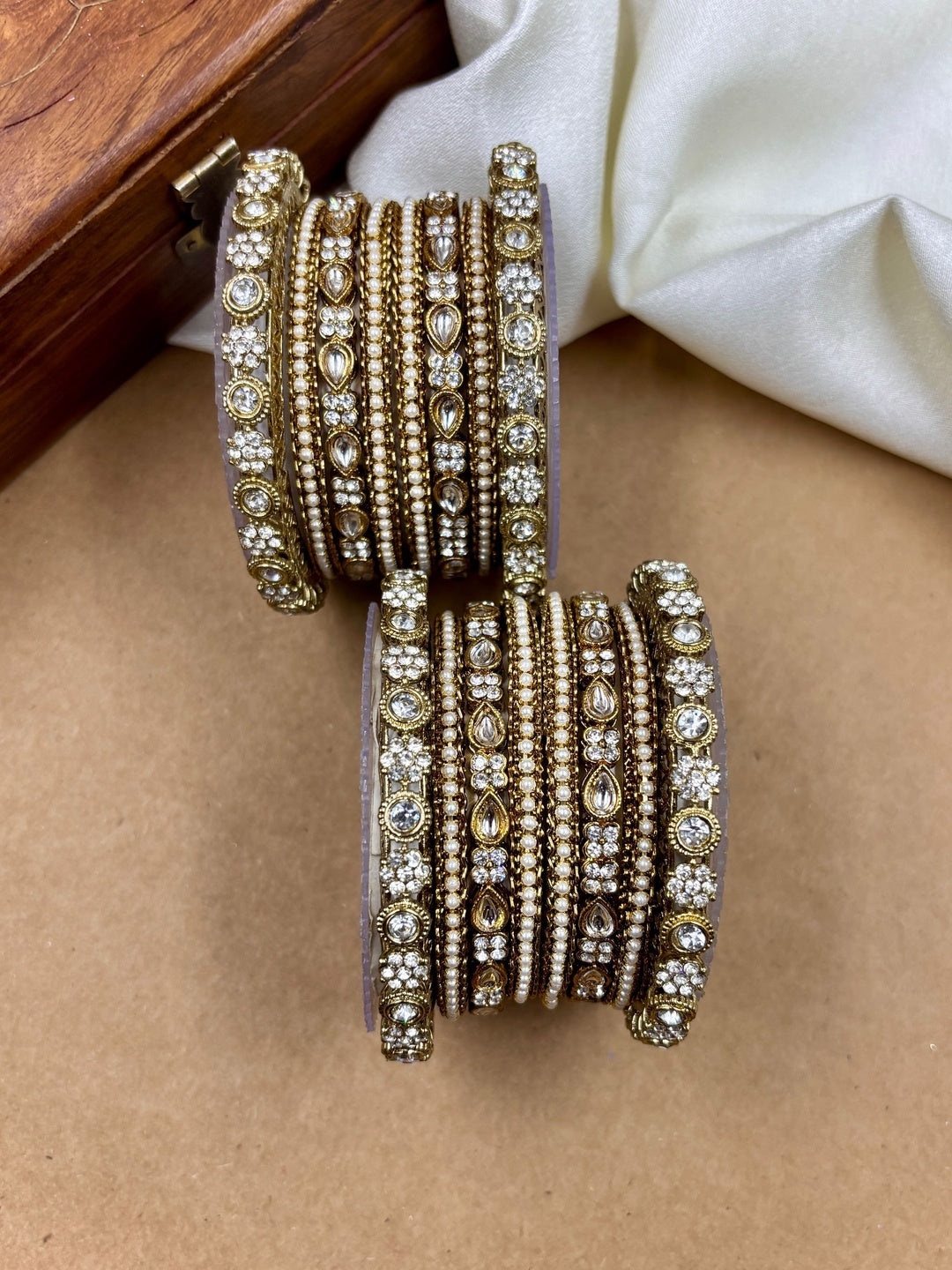 Ishhaara Kundan Bangles Set - A beautiful set of gold bangles adorned with stones and pearls - view 4