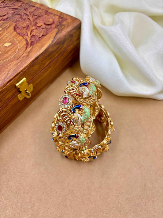 Ishhaara Kundan Peacock Bangle - gold-plated metal bangle with intricate peacock designs and colorful stones
