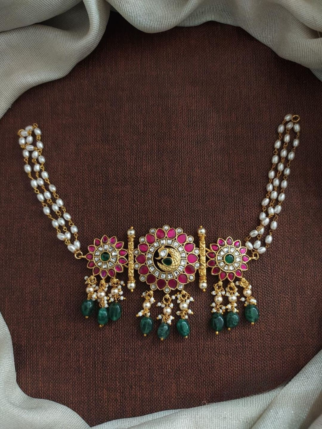 the brand Kundan Peacock Choker Necklace Set — handcrafted Indian jewellery