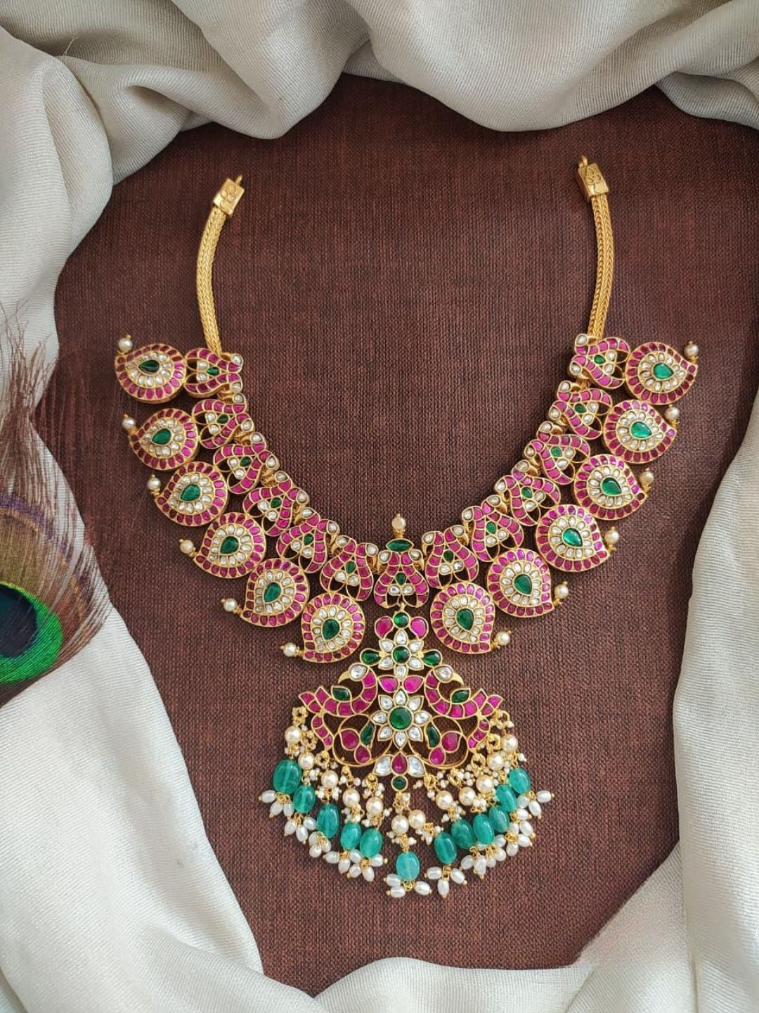 the brand Kundan Temple Necklace with Emerald and Ruby Stones — handcrafted Indian jewellery
