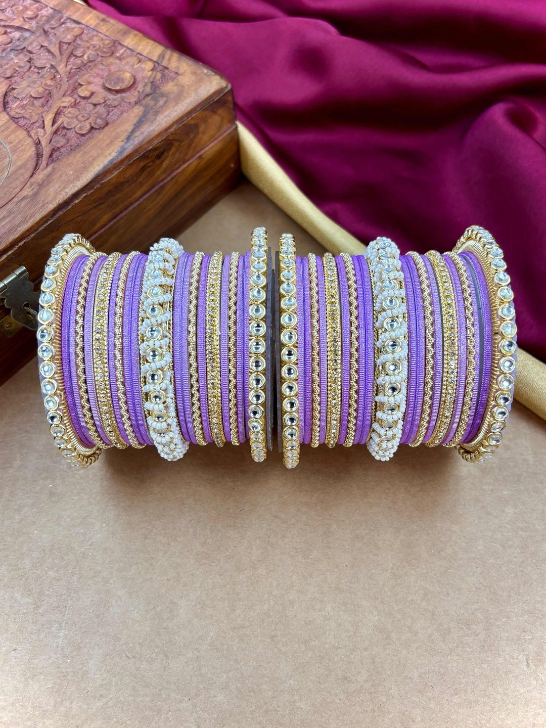 Ishhaara Lavender Embellished Silk Sari - A woman wearing a lavender sari with gold embroidery and traditional Indian jewelry - view 12