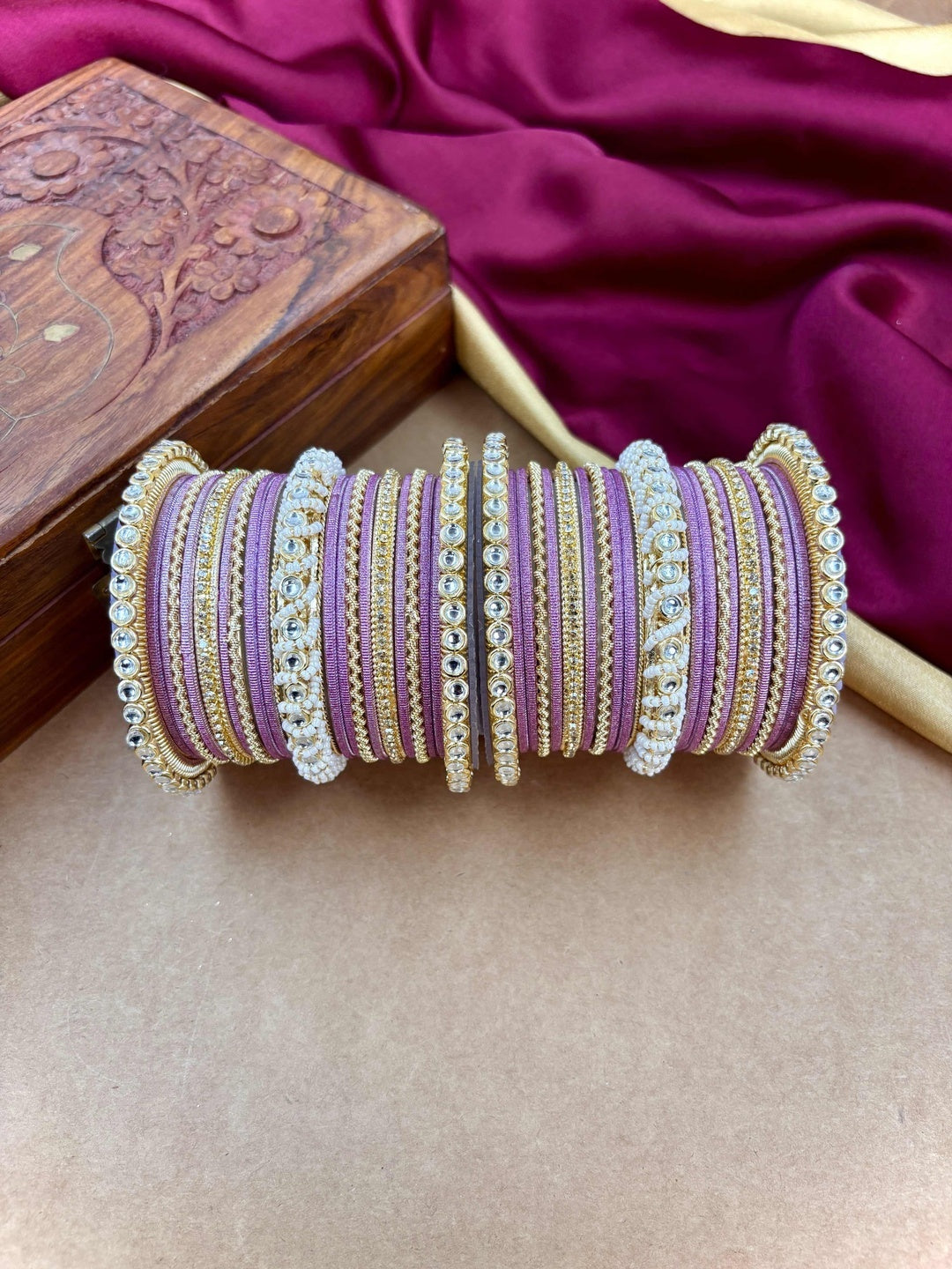 Ishhaara Lavender Embellished Silk Sari - A woman wearing a lavender sari with gold embroidery and traditional Indian jewelry - view 23