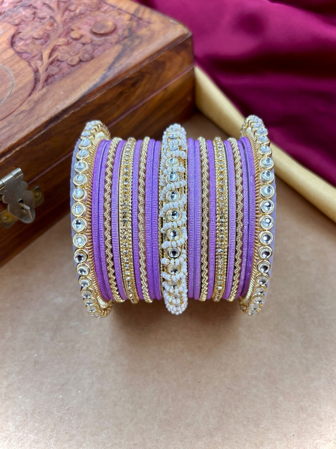 Ishhaara Lavender Embellished Silk Sari - A woman wearing a lavender sari with gold embroidery and traditional Indian jewelry - view 4