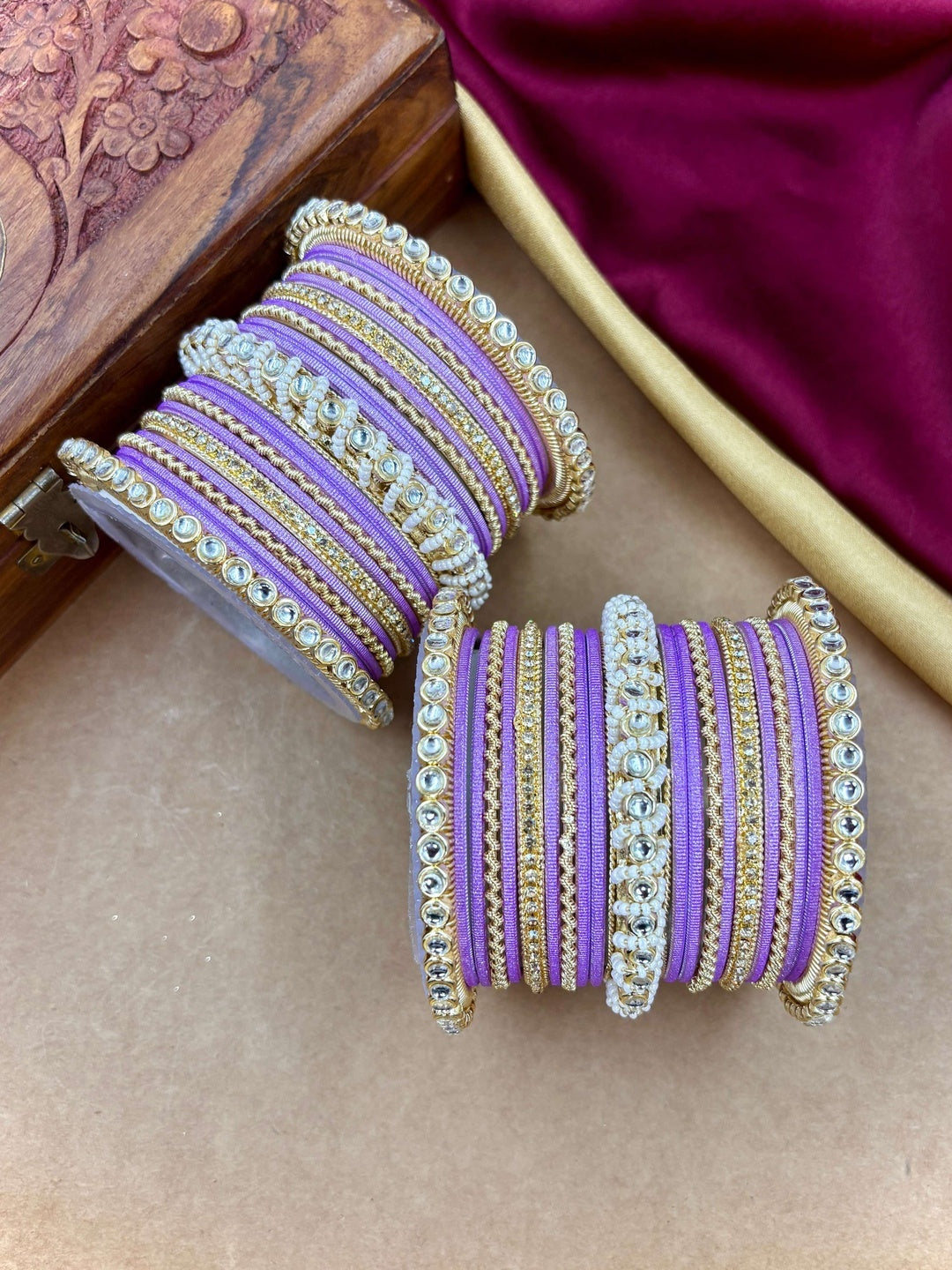 Ishhaara Lavender Embellished Silk Sari - A woman wearing a lavender sari with gold embroidery and traditional Indian jewelry - view 7
