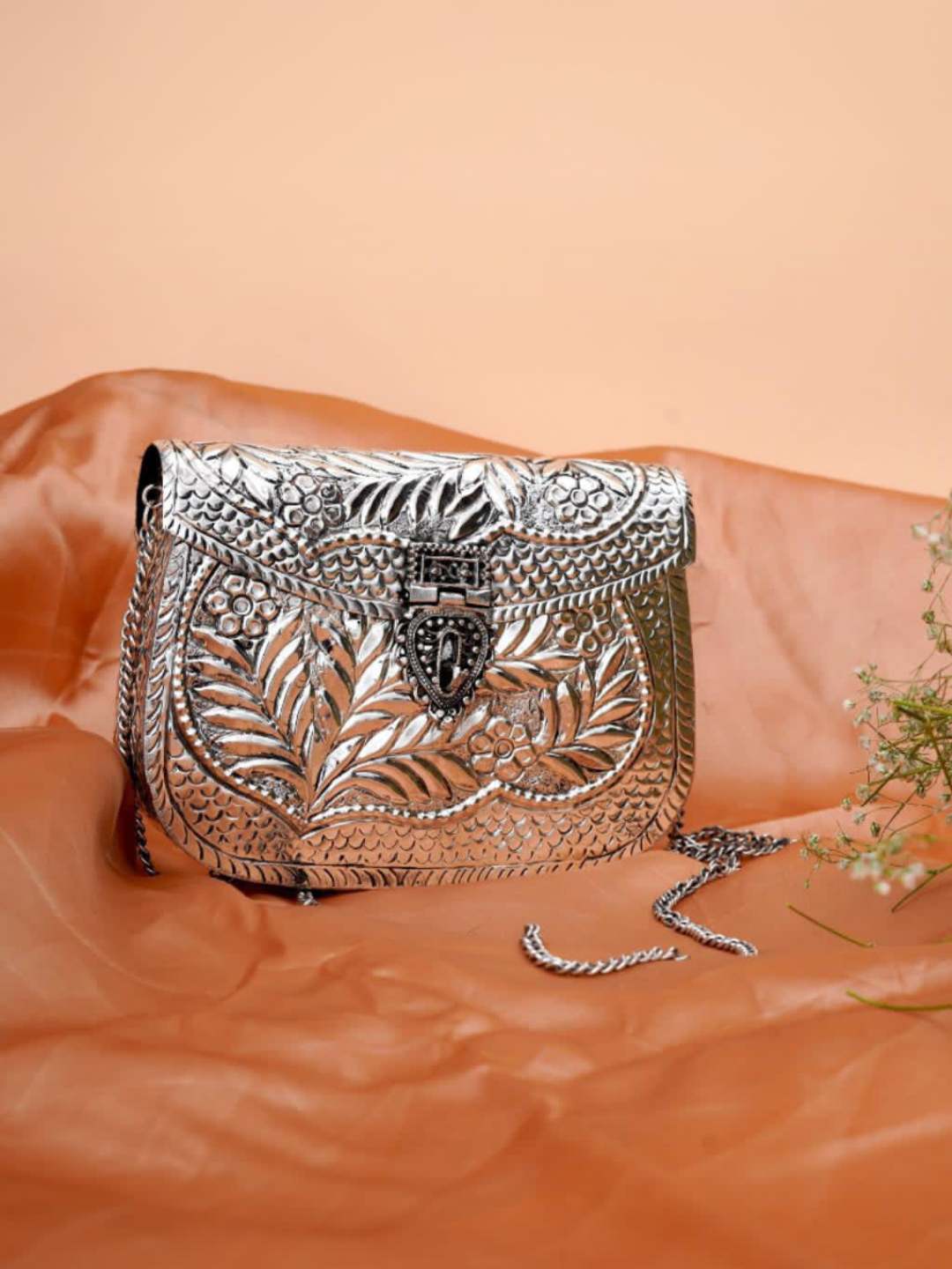 Ishhaara Leaf Designed Exclusive Silver Metal Clutch