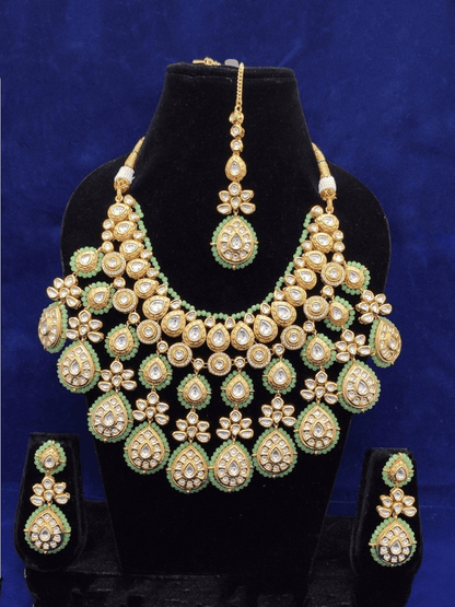 Ishhaara Cut Kundan Drop Tassel Outline Set