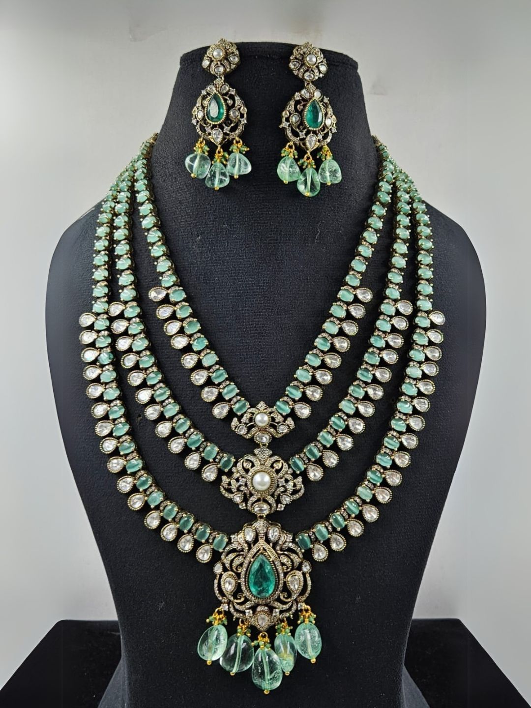 Ishhaara Light Green Traditional Multi Layered Multi Colored Necklace Set