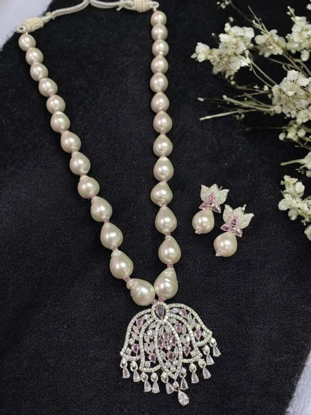 Ishhaara Light Pink Designer Zirconia Pearl Chain Pendant