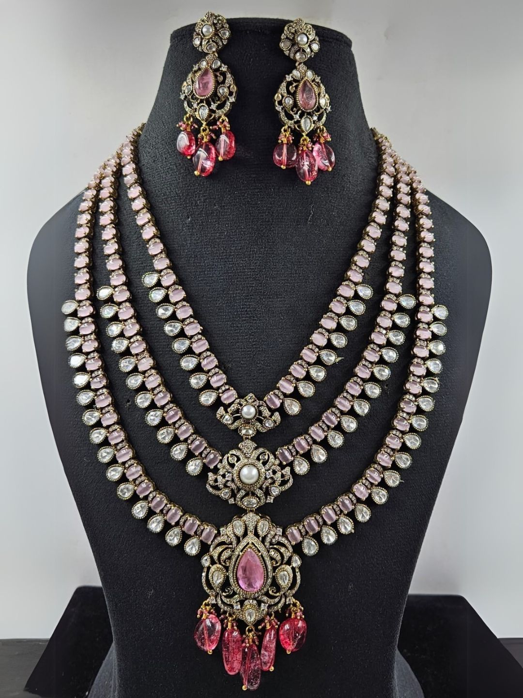 Ishhaara Light Pink Traditional Multi Layered Multi Colored Necklace Set