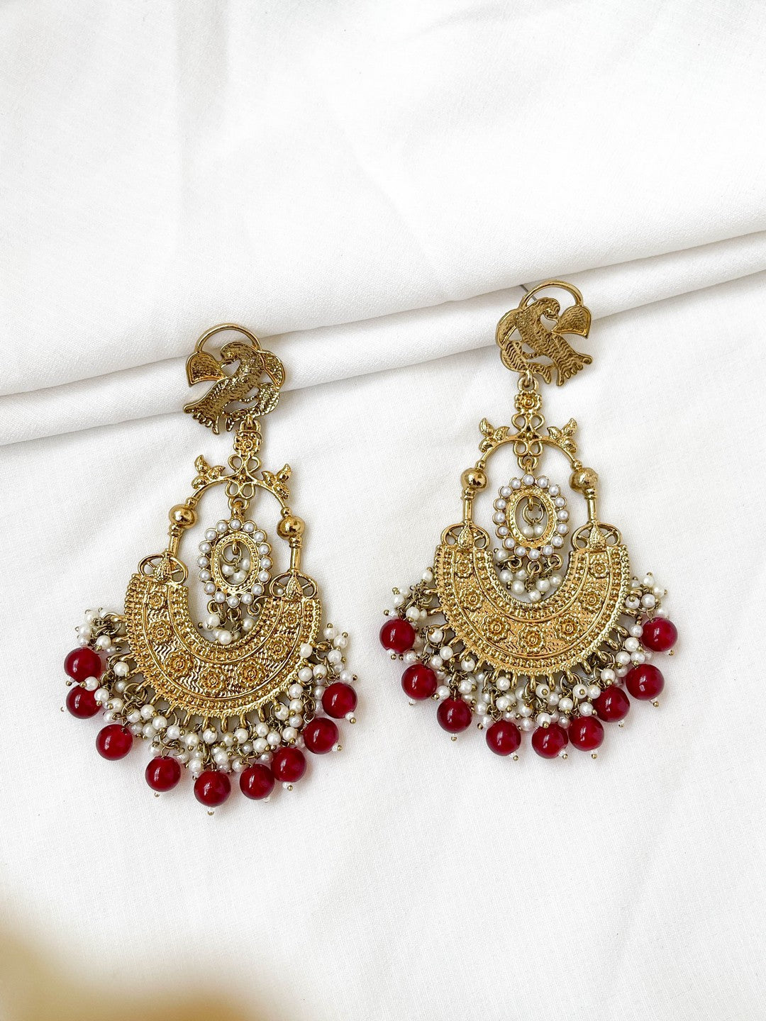 Ishhaara Maroon Peacock Shaped Stones And Beads Chandbalis