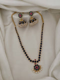 Ishhaara Matte Finish Blue Colored Kemp Pearl Flower Necklace Set