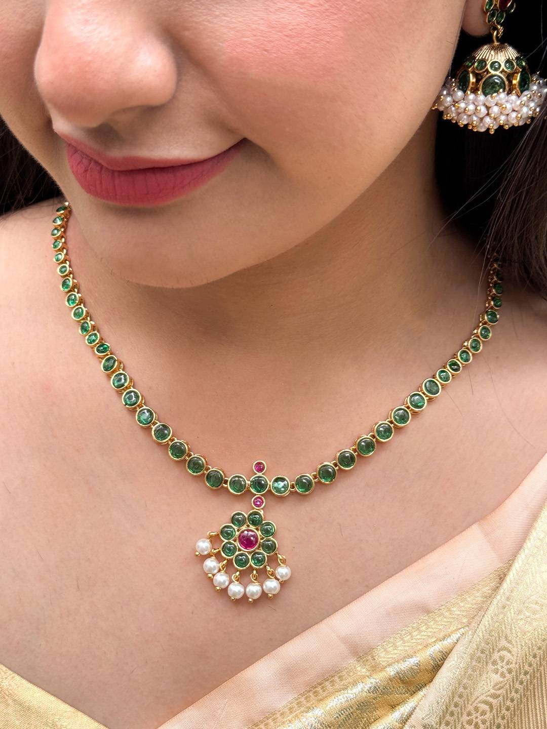 Ishhaara Matte Finish Green Colored Kemp Pearl Flower Necklace Set