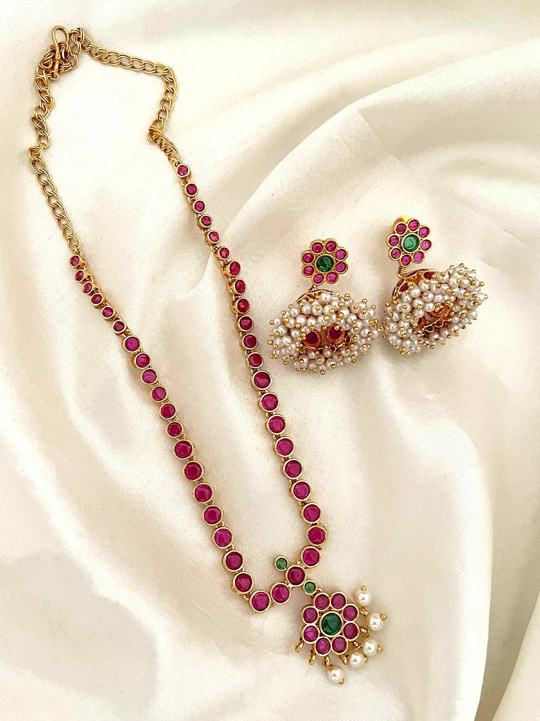 Ishhaara Matte Finish Red Colored Kemp Pearl Flower Necklace Set