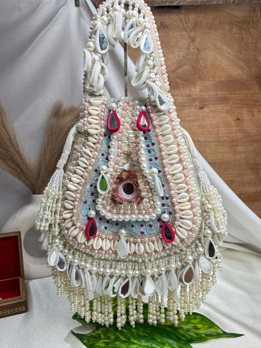 Ishhaara Mesmerizing Mirror Shell And Pearl Handwork Potli