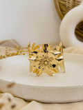 Ishhaara Metal Wide Brimmed Flower Gold Cuff